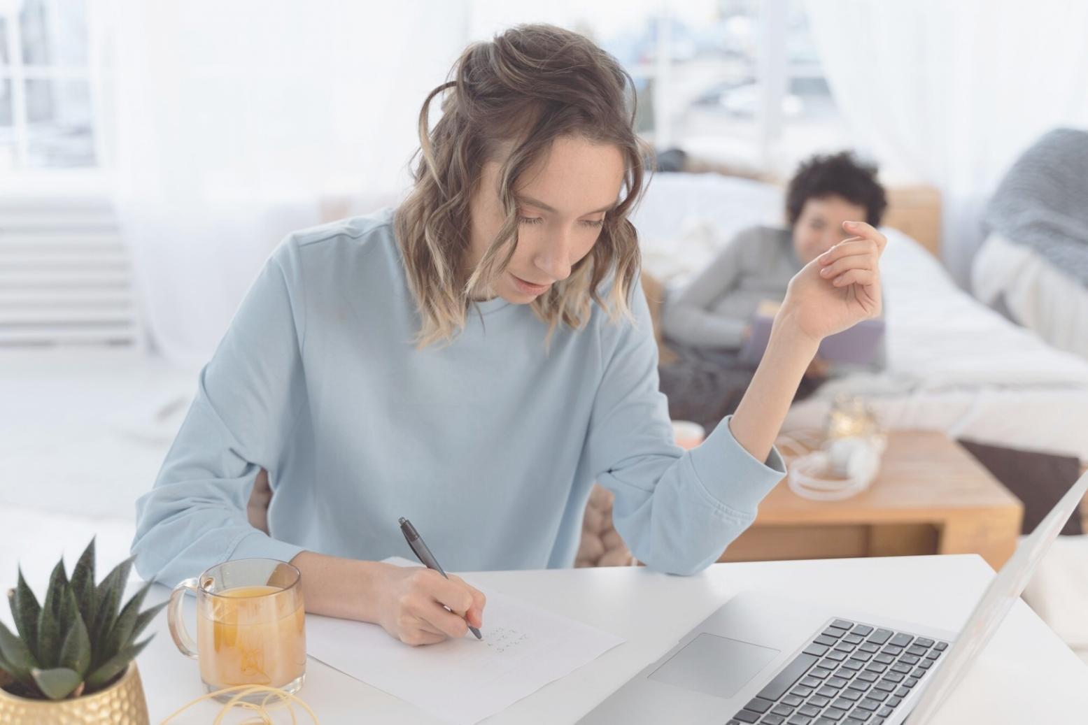 Family reviewing investment strategy documents together at dining table