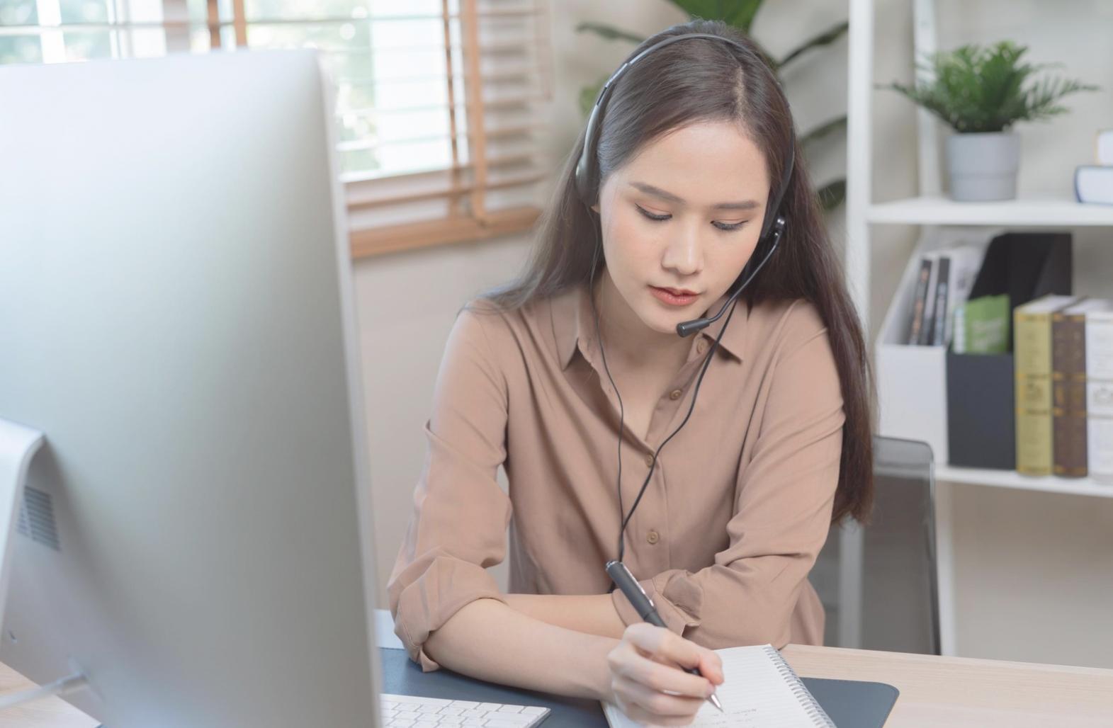 Student analyzing family investment portfolio with spreadsheets and financial documents